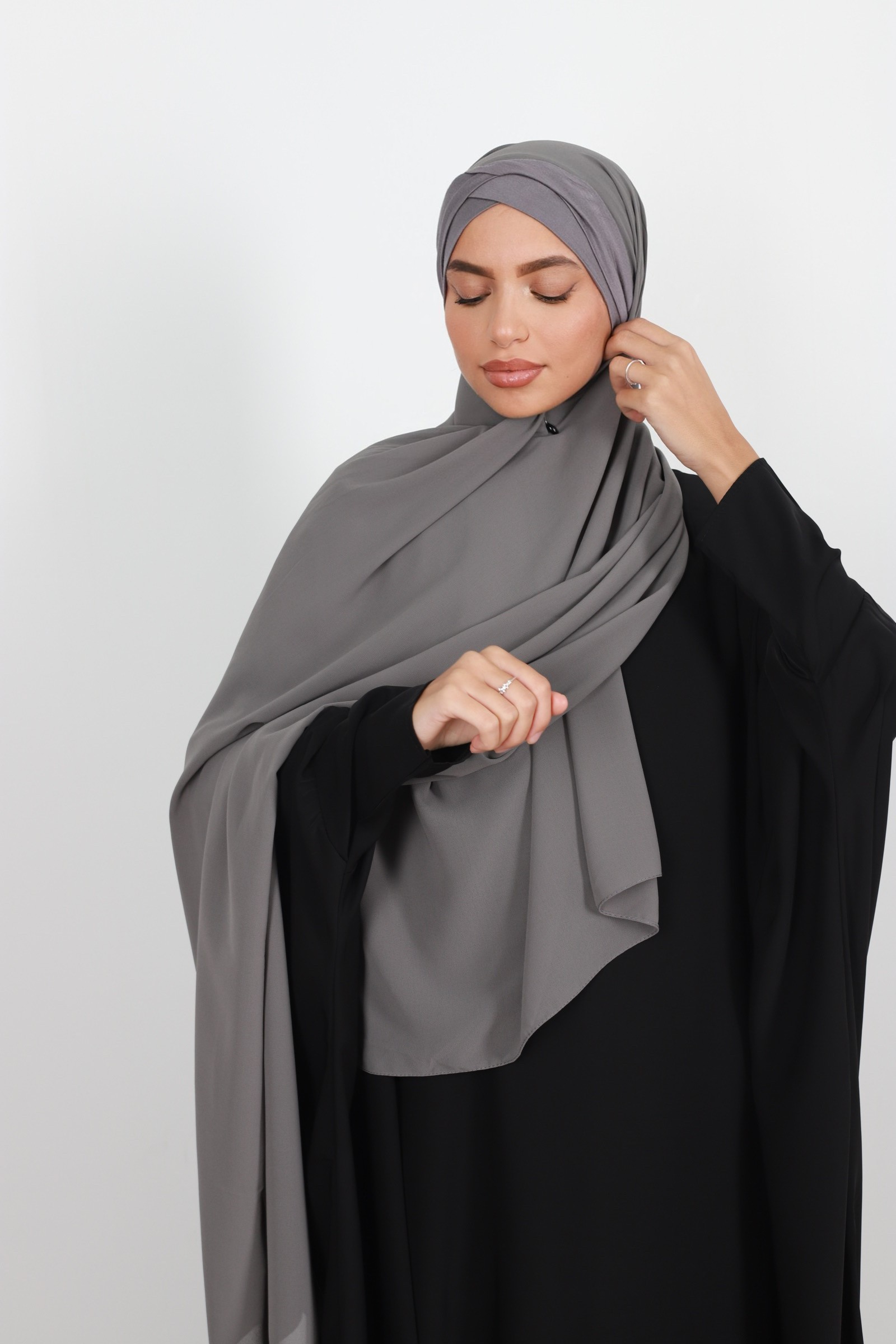 Hijab to put on dark gray hat
